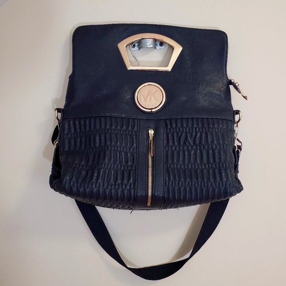 Michael Kors Handbags - Michael Kors Large Black Fold over Purse gold LOGO hardware quilted body